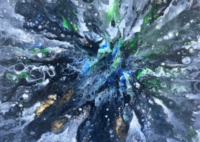 black and white explosion with green blue and gold